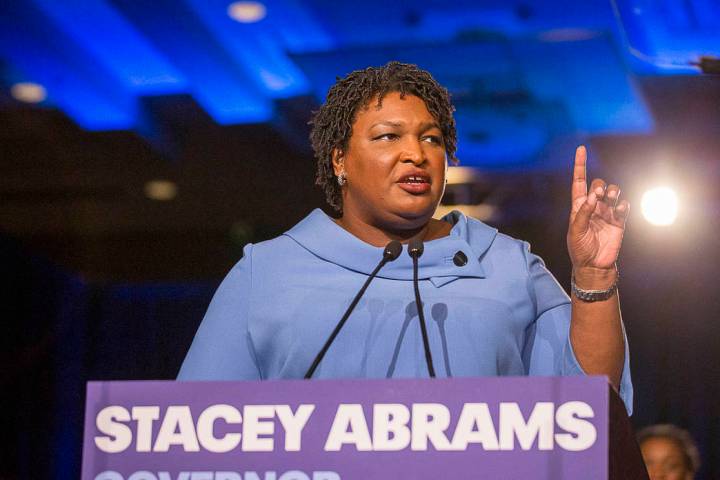 Democratic gubernatorial candidate Stacey Abrams speaks to her supporters during her election n ...