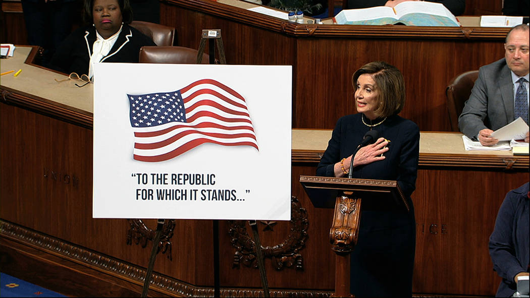 House Speaker Nancy Pelosi of Calif., speaks as the House of Representatives debates the articl ...