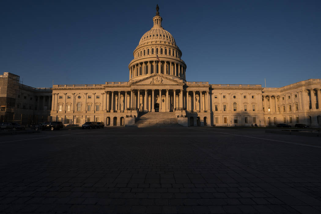 The Capitol is seen in Washington, early Wednesday, Dec. 18, 2019. President Donald Trump is on ...