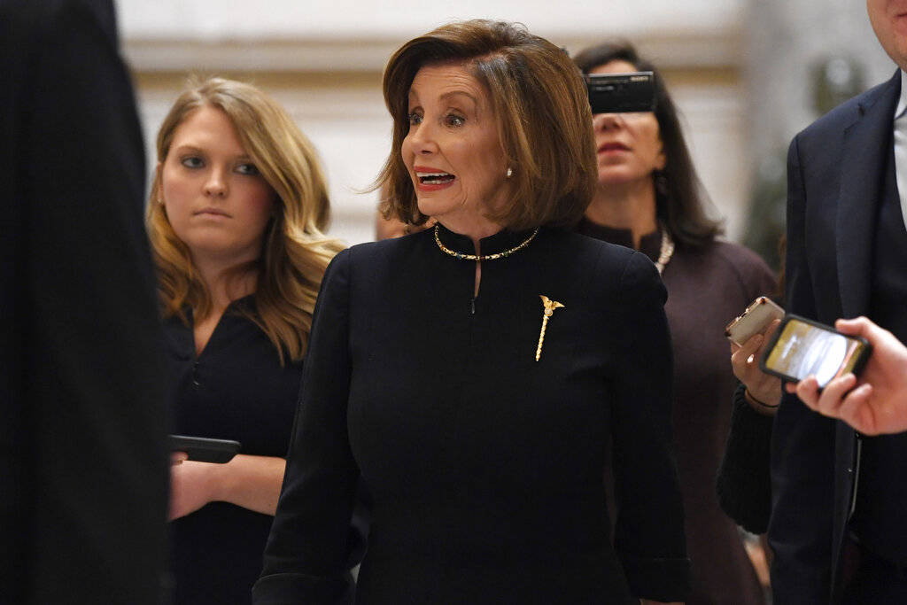 House Speaker Nancy Pelosi of Calif., walks toward the House floor on Capitol Hill in Washingto ...