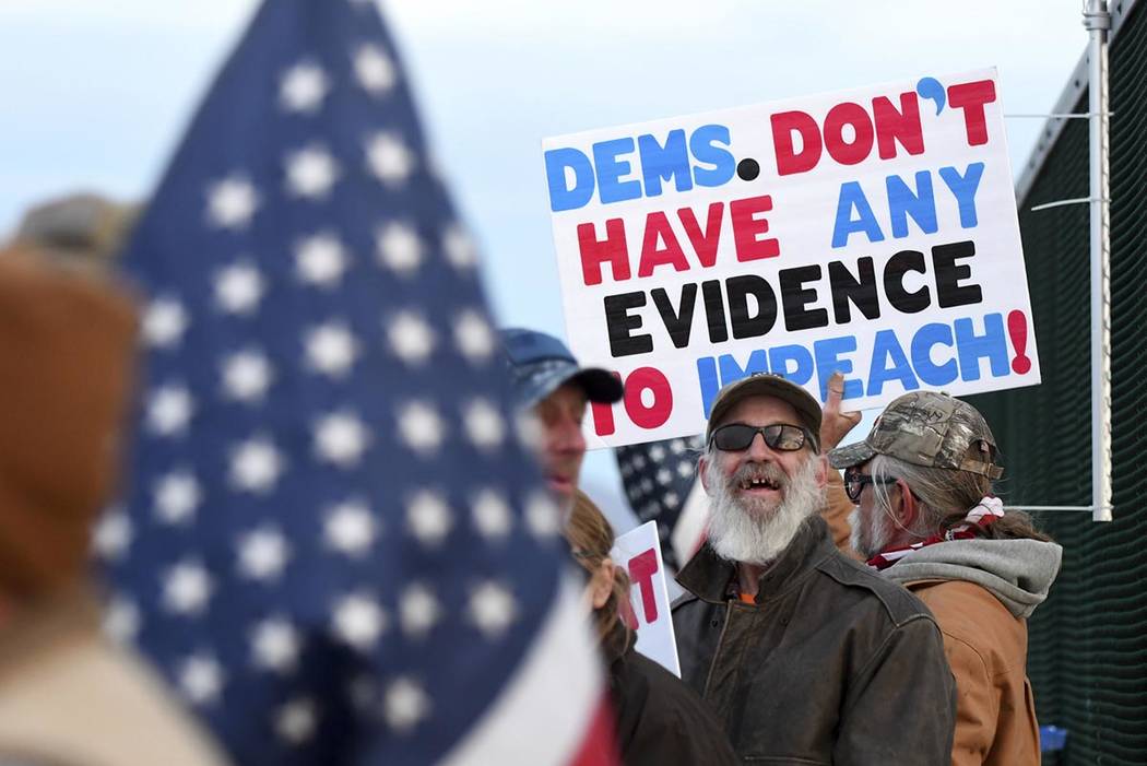 President Donald Trump supporters demonstrate along Bear Valley Road in Victorville, Calif., on ...