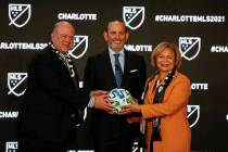 Major League Soccer Commissioner Don Garber, left, Charlotte MLS owner David Tepper, center, an ...