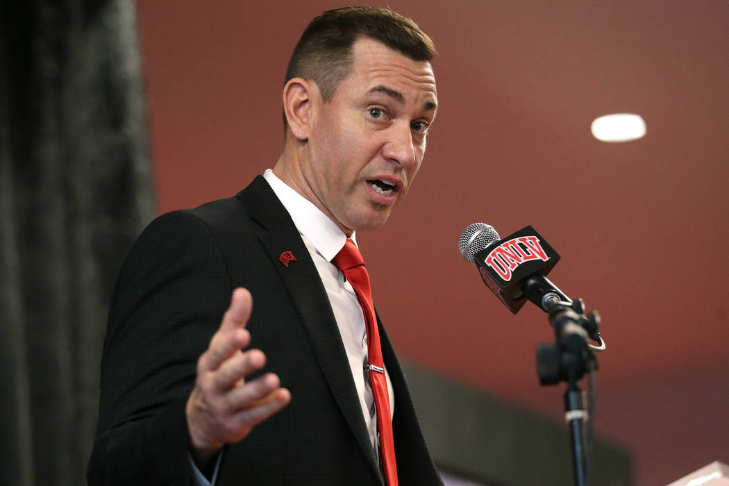 UNLV's new football head coach Marcus Arroyo speaks during a press conference at UNLV's Fertitt ...