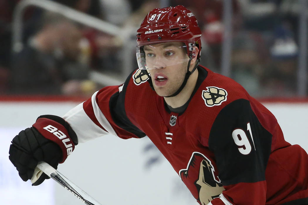 Phoenix Coyotes fans shop for jerseys before the Coyotes game