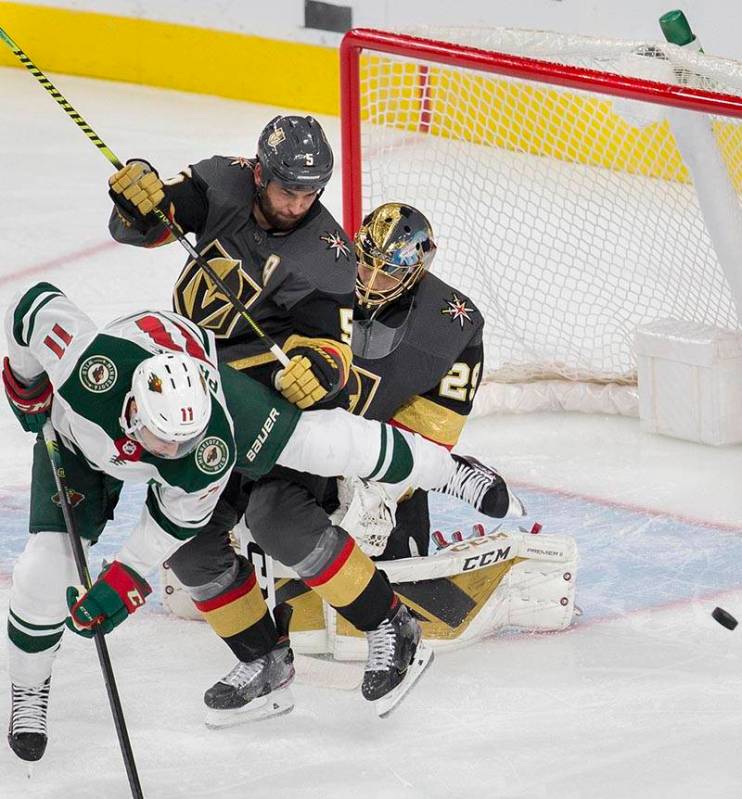 Vegas Golden Knights goaltender Marc-Andre Fleury (29) makes a save with Vegas Golden Knights d ...