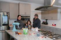 Bonnie D’Amico, her daughter, Mia, and fiancée, Joe Cantino, are in the kitchen of their new ...