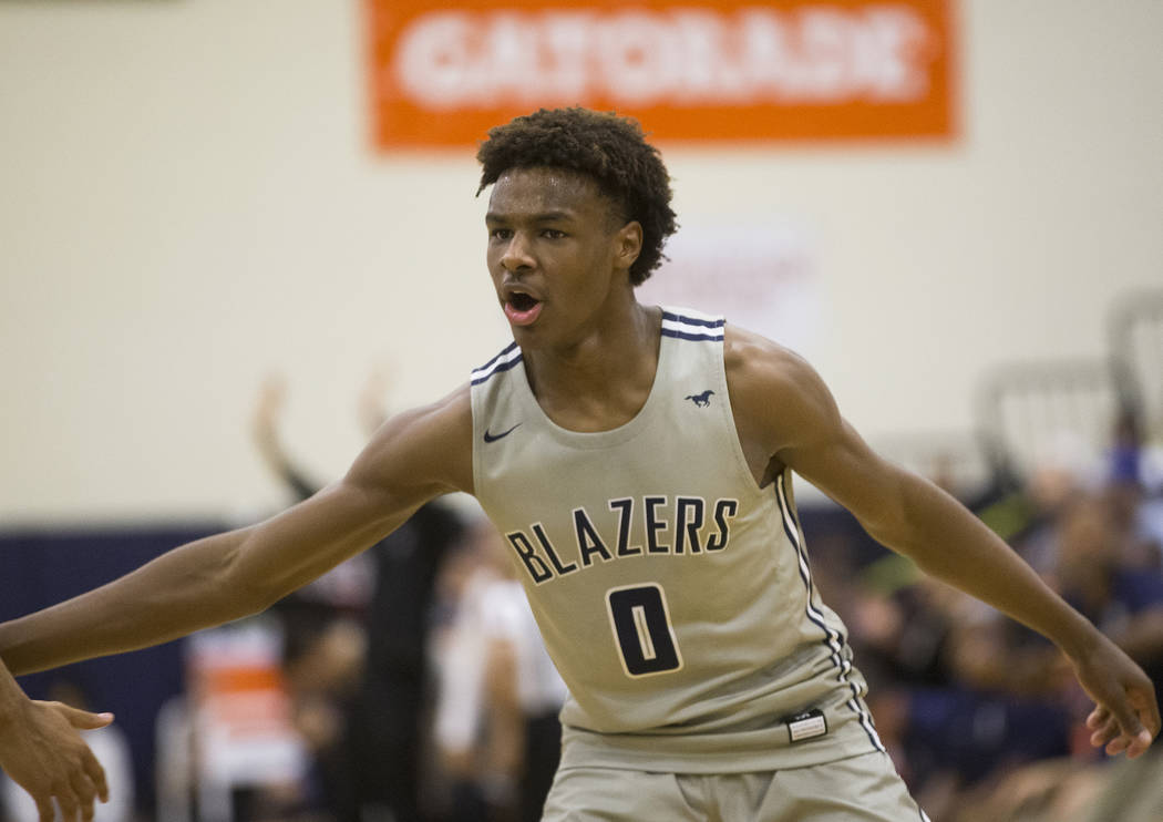 Sierra Canyon freshman guard Bronny James (0), right, son of Los Angeles Lakers star forward Le ...