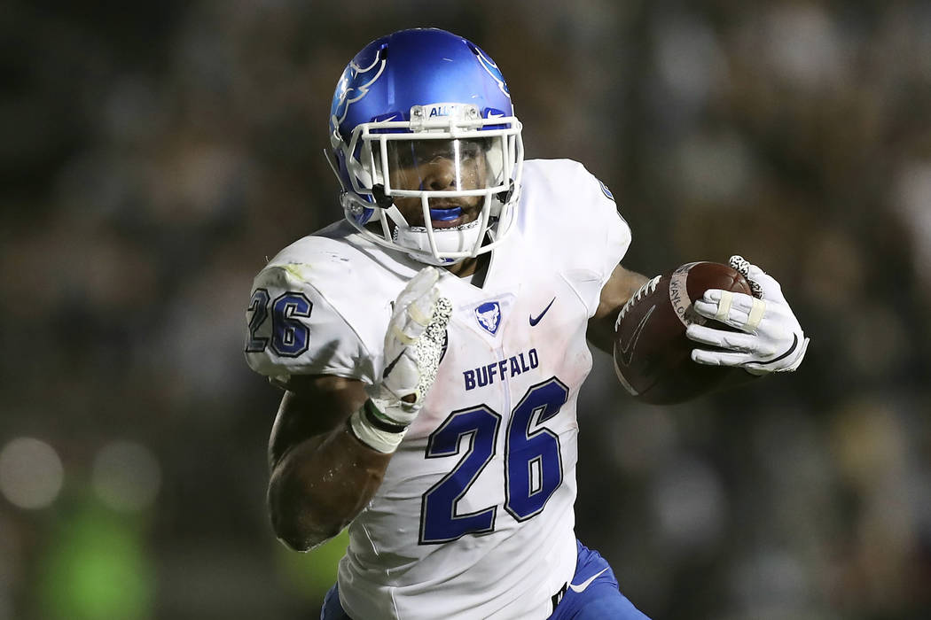 Buffalo running back Jaret Patterson (26) carries the ball during an NCAA college football game ...