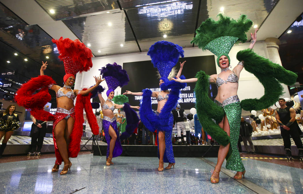 Showgirls, from left, Lauren Clark, Brooke Brown, Tara Noseck, and Jennifer Vossmer perform dur ...