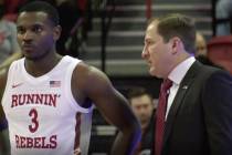 Amauri Hardy and UNLV head coach T.J. Otzelberger on the sideline during a loss to Pacific on W ...