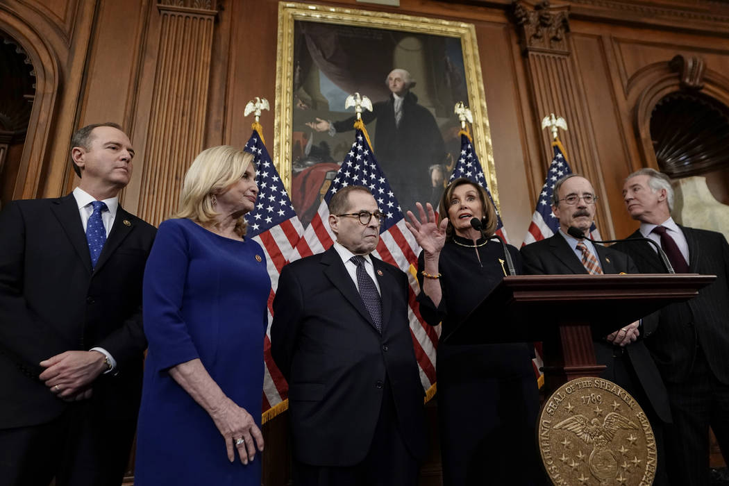 Speaker of the House Nancy Pelosi, D-Calif., addresses reporters at the Capitol in Washington, ...