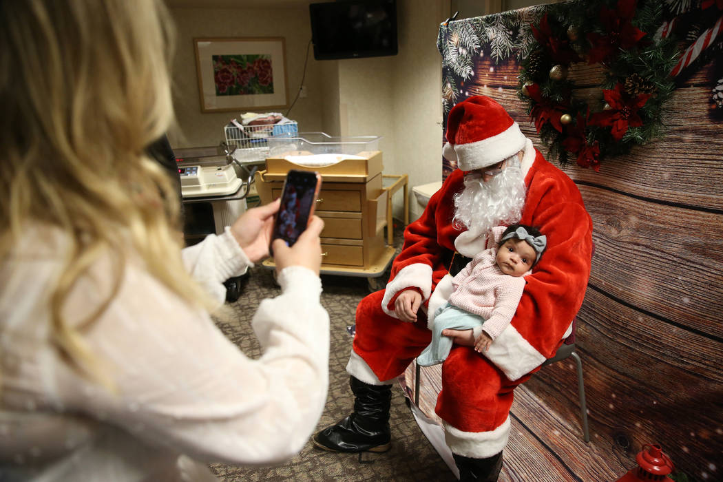 Alivia Aviles, 2months old, with Santa Claus at Southern Hills Hospital in Las Vegas, Wednesday ...