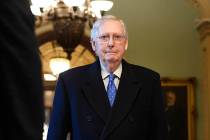 Senate Majority Leader Mitch McConnell of Ky., walks to his office on Capitol Hill in Washingto ...