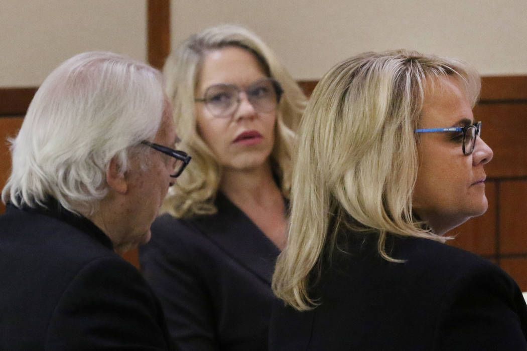 Las Vegas Justices of the Peace Melanie Andress-Tobiasson, center, and Amy Chelini, listen as A ...