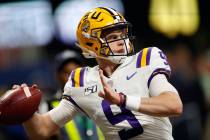 In this Dec. 7, 2019, file photo, LSU quarterback Joe Burrow (9) warms up before the Southeaste ...