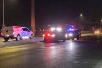 Police units block traffic near East Lake Mead Boulevard and North Pecos Road after a two-vehic ...