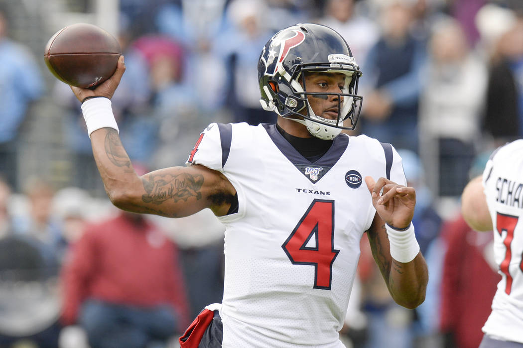 Houston Texans quarterback Deshaun Watson passes against the Tennessee Titans in the first half ...