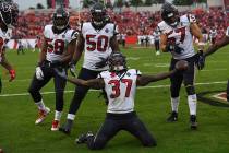 Houston Texans strong safety Jahleel Addae (37) celebrates after intercepting a pass by Tampa B ...