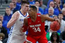 Ohio State's Kaleb Wesson (34) drives into Kentucky's Nate Sestina during the first half of an ...