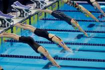 Competitors start the women's 200-meter freestyle during an International Swimming League event ...