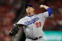 In this Oct. 6, 2019, file photo, Los Angeles Dodgers starting pitcher Hyun-Jin Ryu throws to a ...