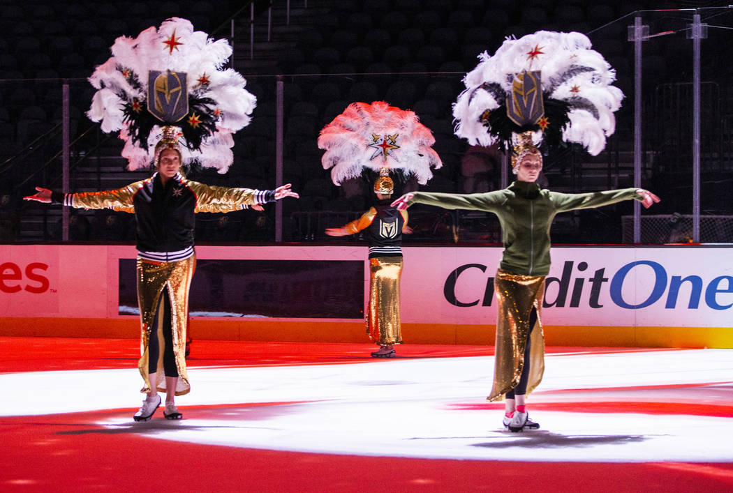 The Golden Belles practice on the ice during a rehearsal for the Vegas Golden Knights holiday p ...