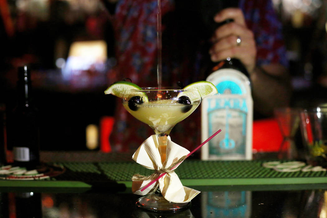 A Baby Yoda cocktail is made at the Golden Tiki in Las Vegas on Monday, Dec. 23, 2019. Elizabet ...