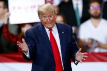In a Dec. 18, 2019, photo, President Donald Trump speaks at a campaign rally in Battle Creek, M ...