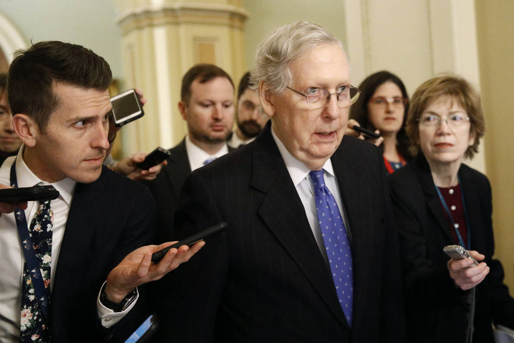 Senate Majority Leader Mitch McConnell of Ky., speaks with reporters after walking off the Sena ...