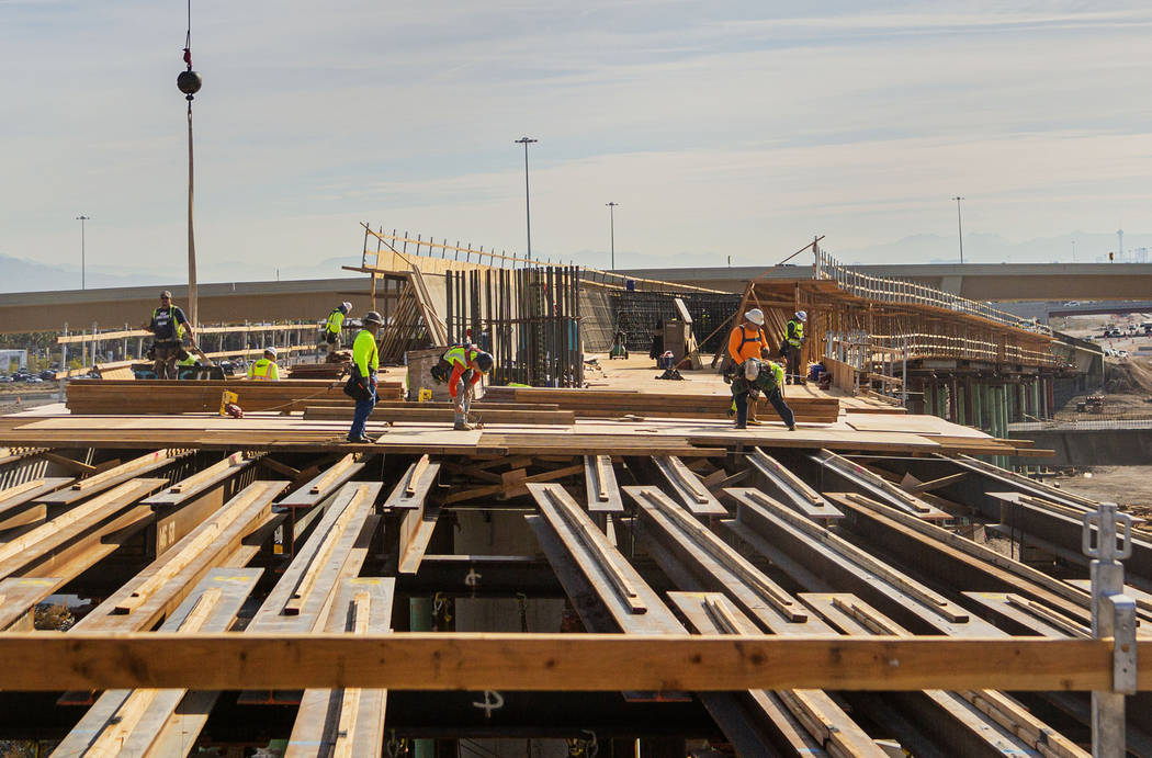 Construction continues on the Centennial Bridge connecting U.S. Highway 95 northbound to the 21 ...