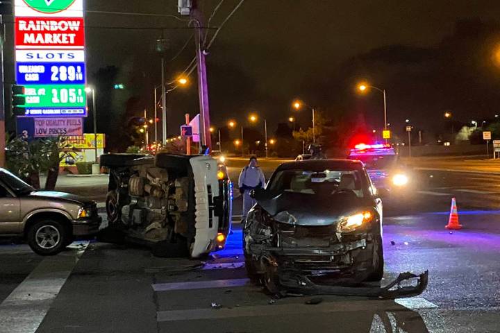 Police investigate a crash Tuesday, Dec. 24, 2019, at East Lake Mead Boulevard and North Walnut ...