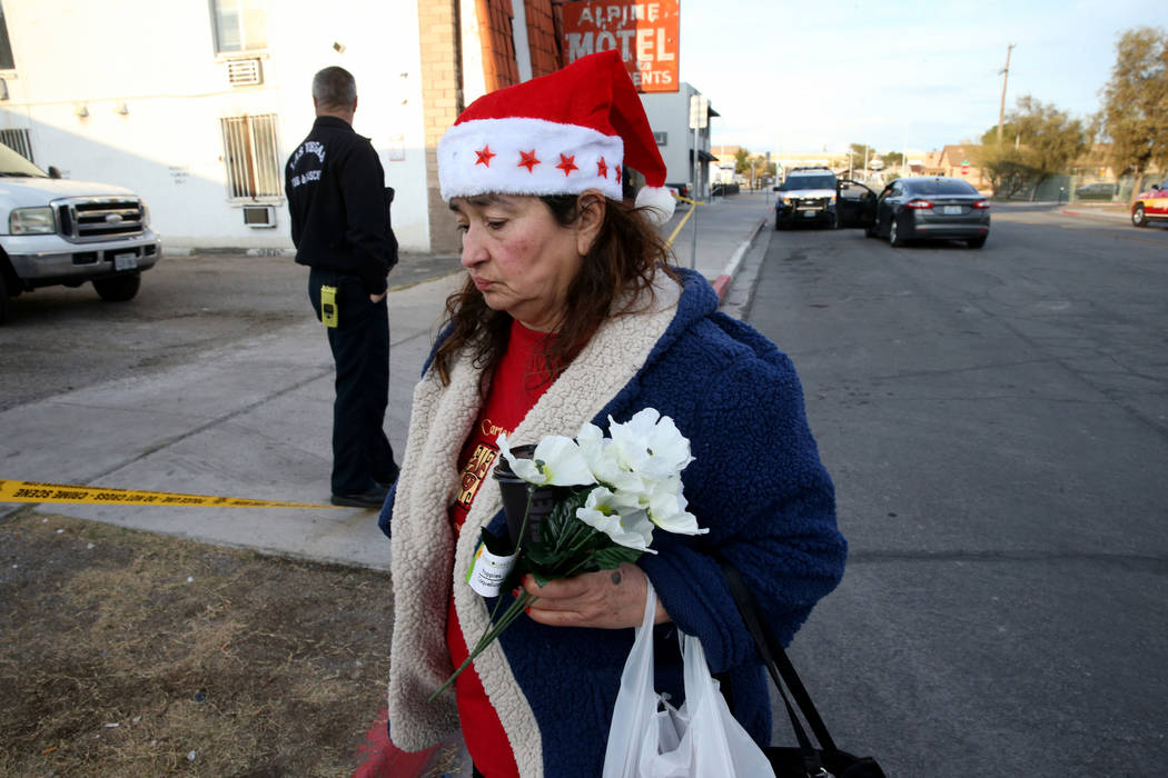 Blanca Daner, right, arrives at the Alpine Motel Apartments Wednesday, Dec. 25, 2019, to place ...
