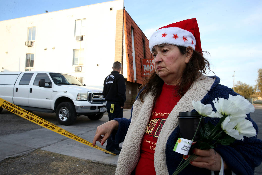 Blanca Daner, right, arrives at the Alpine Motel Apartments Wednesday, Dec. 25, 2019, to place ...