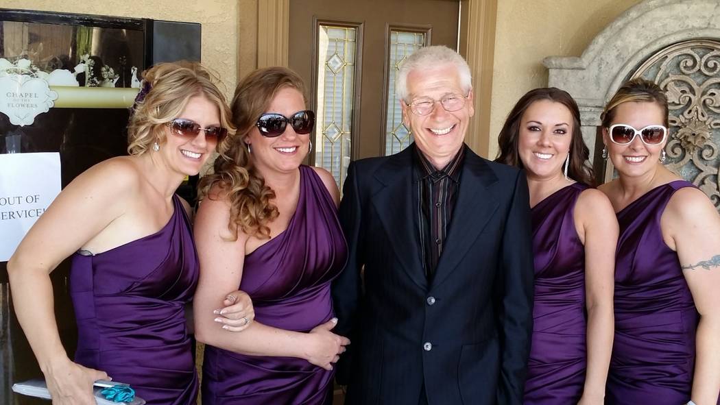 Henry Pinc, center, at his daughter Eva's wedding in 2014 in Las Vegas. (Courtesy Eva Evgen)