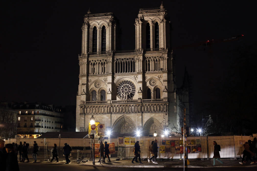 Notre Dame cathedral is pictured in Paris, Tuesday, Dec. 24, 2019. Notre Dame Cathedral is unab ...