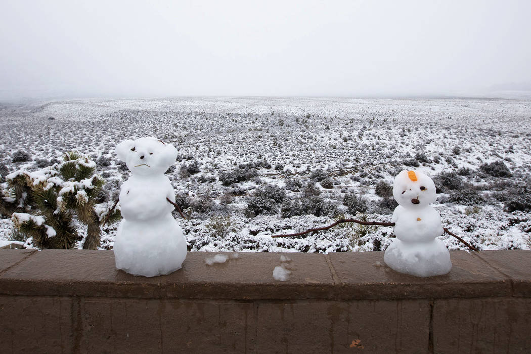 Snowmen are left behind at Red Rock Canyon Overlook on Thursday, Dec. 26, 2019, in Las Vegas. ( ...