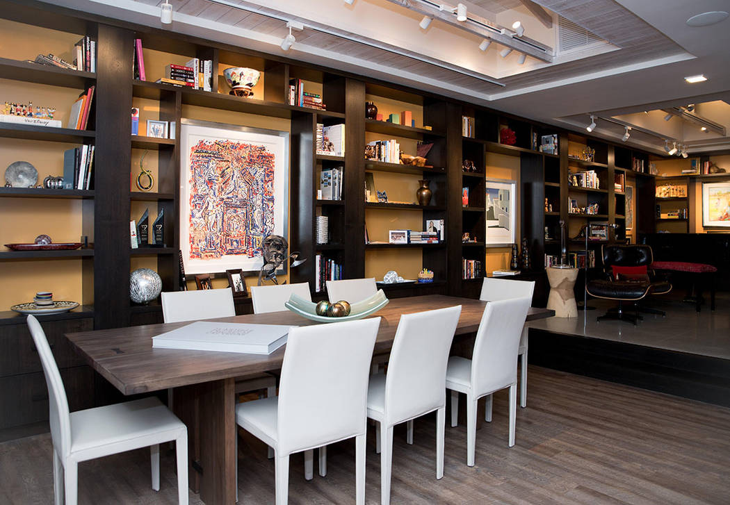 A wall of book shelves line the living room. (Tonya Harvey Real Estate Millions)