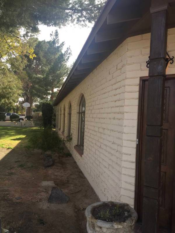 BEFORE: The home had windows at the side that were changed to doors. (Jon Sparer)