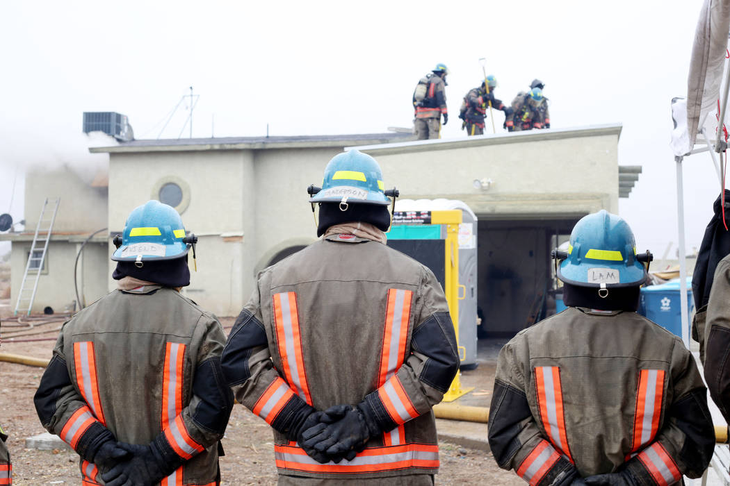 The Clark County Fire Department conducts a live fire training on a house located at 7051 W. Pe ...