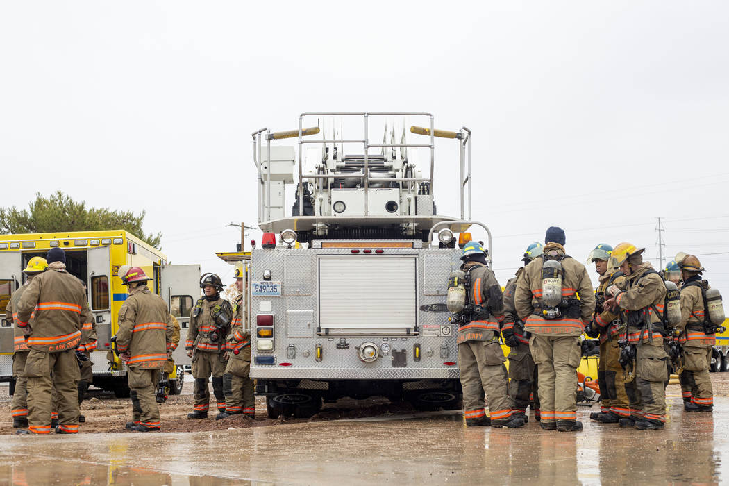 The Clark County Fire Department conducts a live fire training on a house located at 7051 W. Pe ...