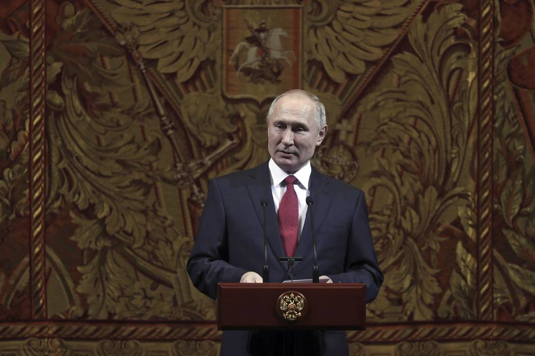 Russian President Vladimir Putin delivers his speech at a gala on the occasion of the New Year ...