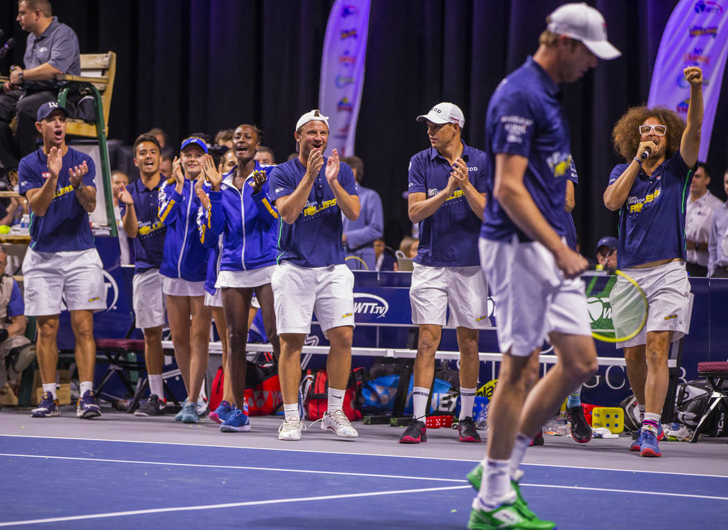 Vegas Rollers' teammates congratulate Sam Querrey as he closes the gap in score during his men' ...