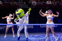 The Vegas Rollers' mascot King performs with the Rollers Dancers during a break between sets ve ...
