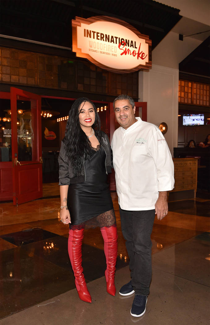 Ayesha Curry and Michael Mina at the opening of International Smoke at MGM Grand on Dec. 30, 20 ...