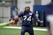 Seattle Seahawks running back Marshawn Lynch warms up for NFL football practice, Friday, Dec. 2 ...