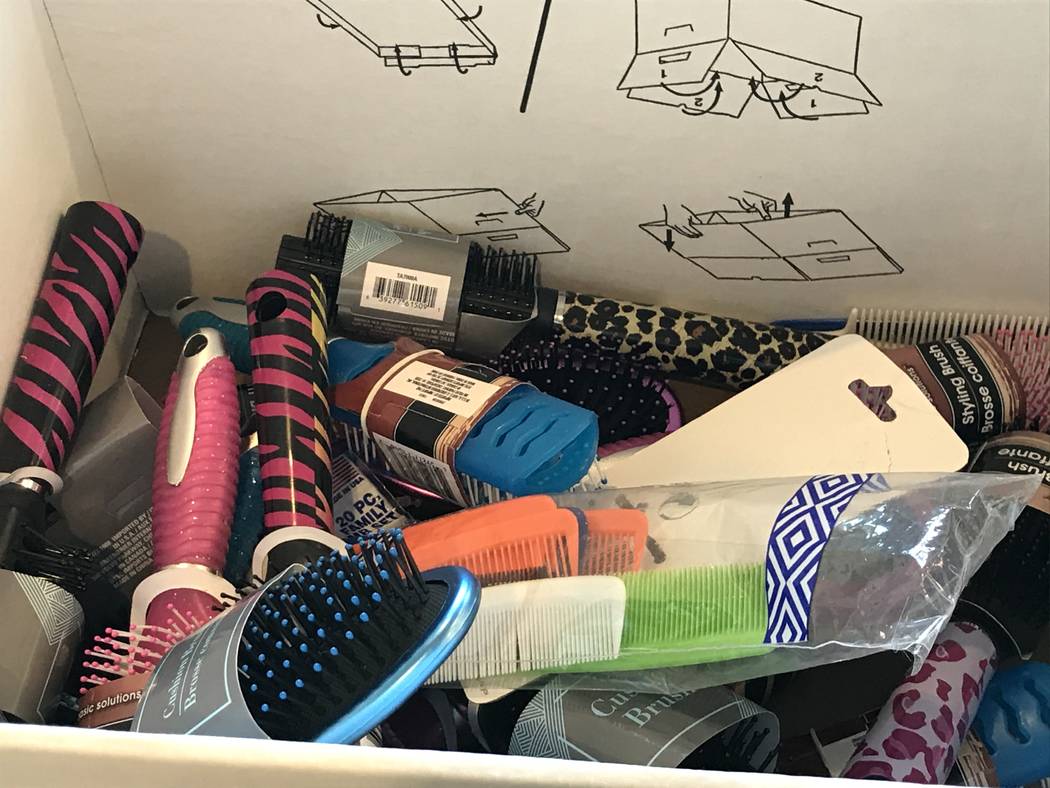 Hairbrushes are pictured Saturday at the Mob Museum that will be donated to victims of the Dec. ...