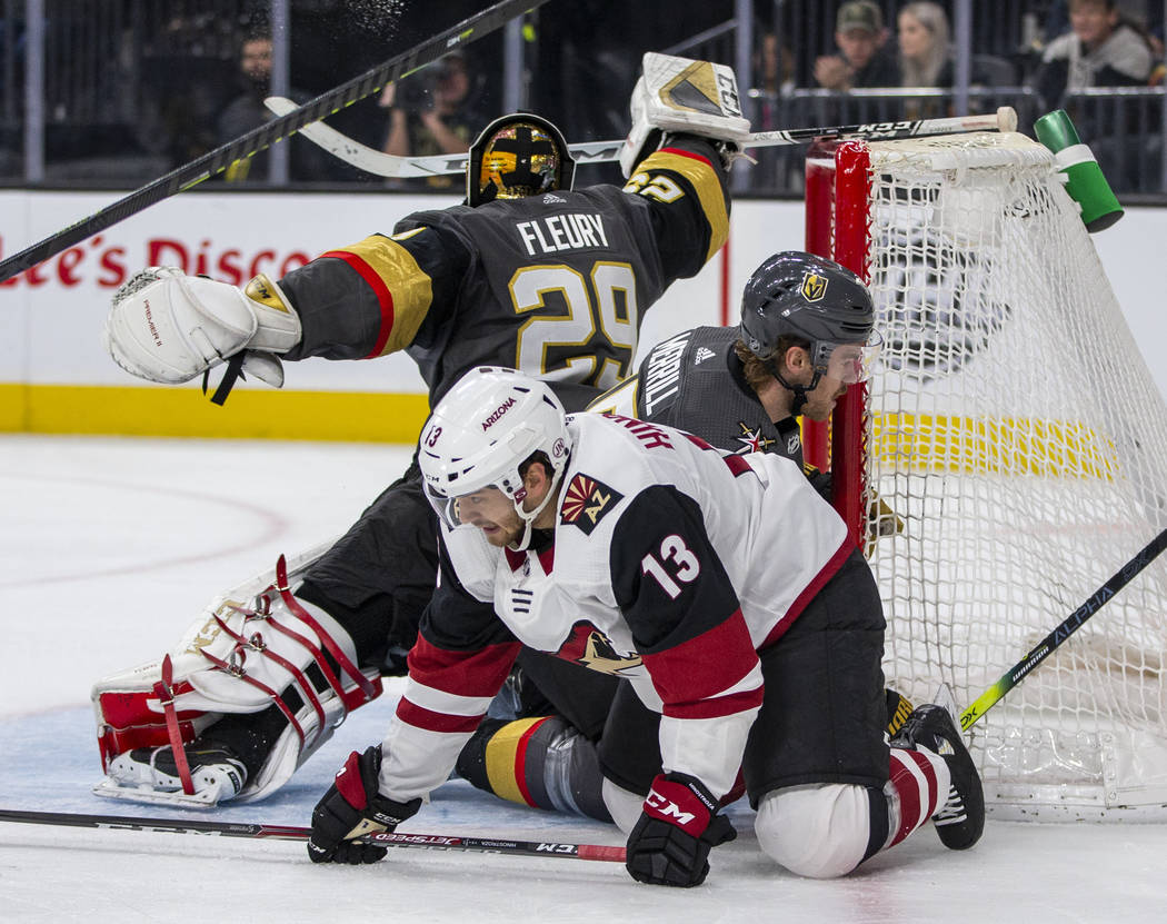Vegas Golden Knights goaltender Marc-Andre Fleury (29, center) defends the net from another sho ...
