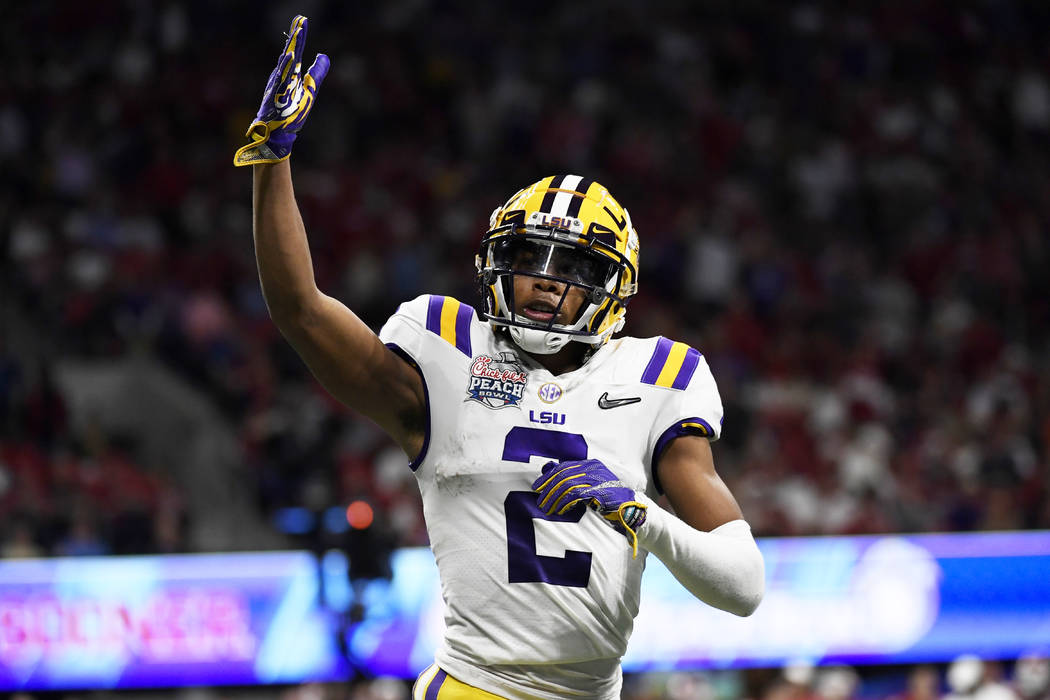 LSU wide receiver Justin Jefferson (2) celebrates his touchdown against Oklahoma during the fir ...