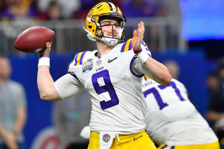 LSU quarterback Joe Burrow (9) works against Oklahoma during the first half of the Peach Bowl N ...