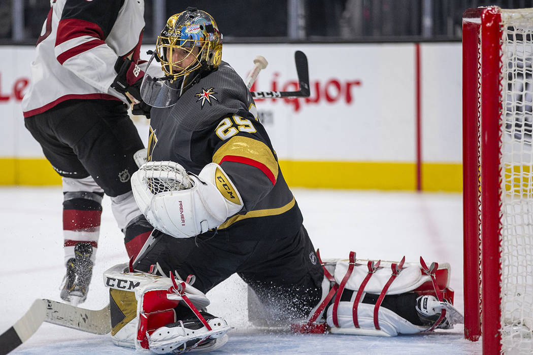 Vegas Golden Knights goaltender Marc-Andre Fleury (29) stops a power-play shot on goal from the ...